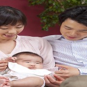 Asian parents with baby